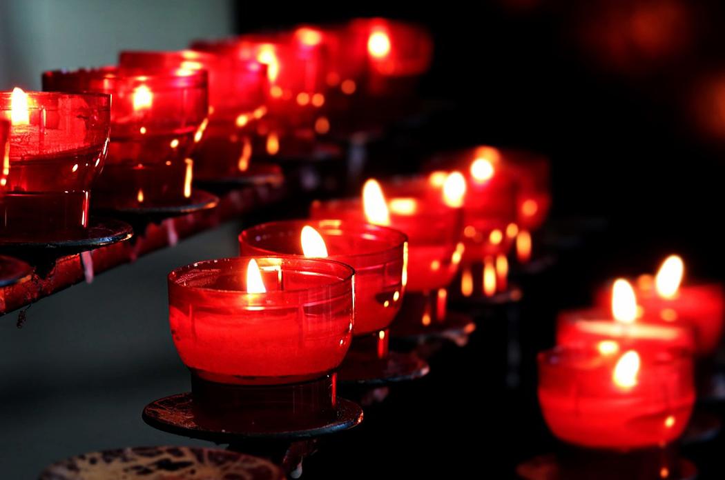 lit votive candles